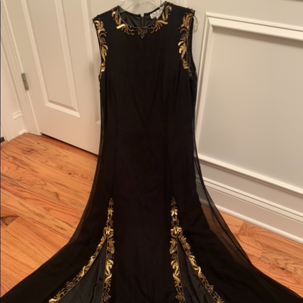1/2 price!! Black gown with gold beading at sleeves and hem line